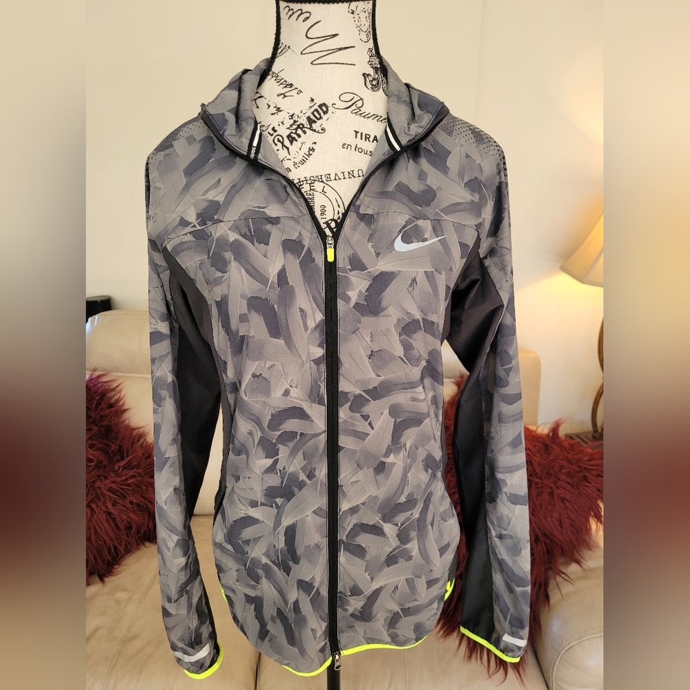 Nike womans running shell jacket. Size small.